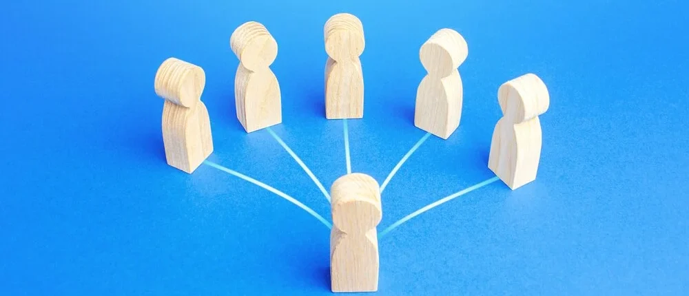 networking concept wooden figures of people